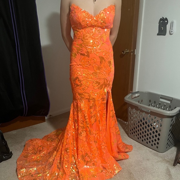 Beautiful orange sequin gown